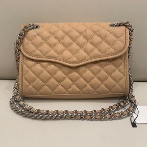 Rebecca Minkoff tan quilted leather crossbody.